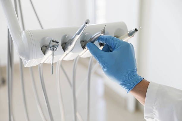 Professional Emergency Dentist technician working in Fayetteville, NC